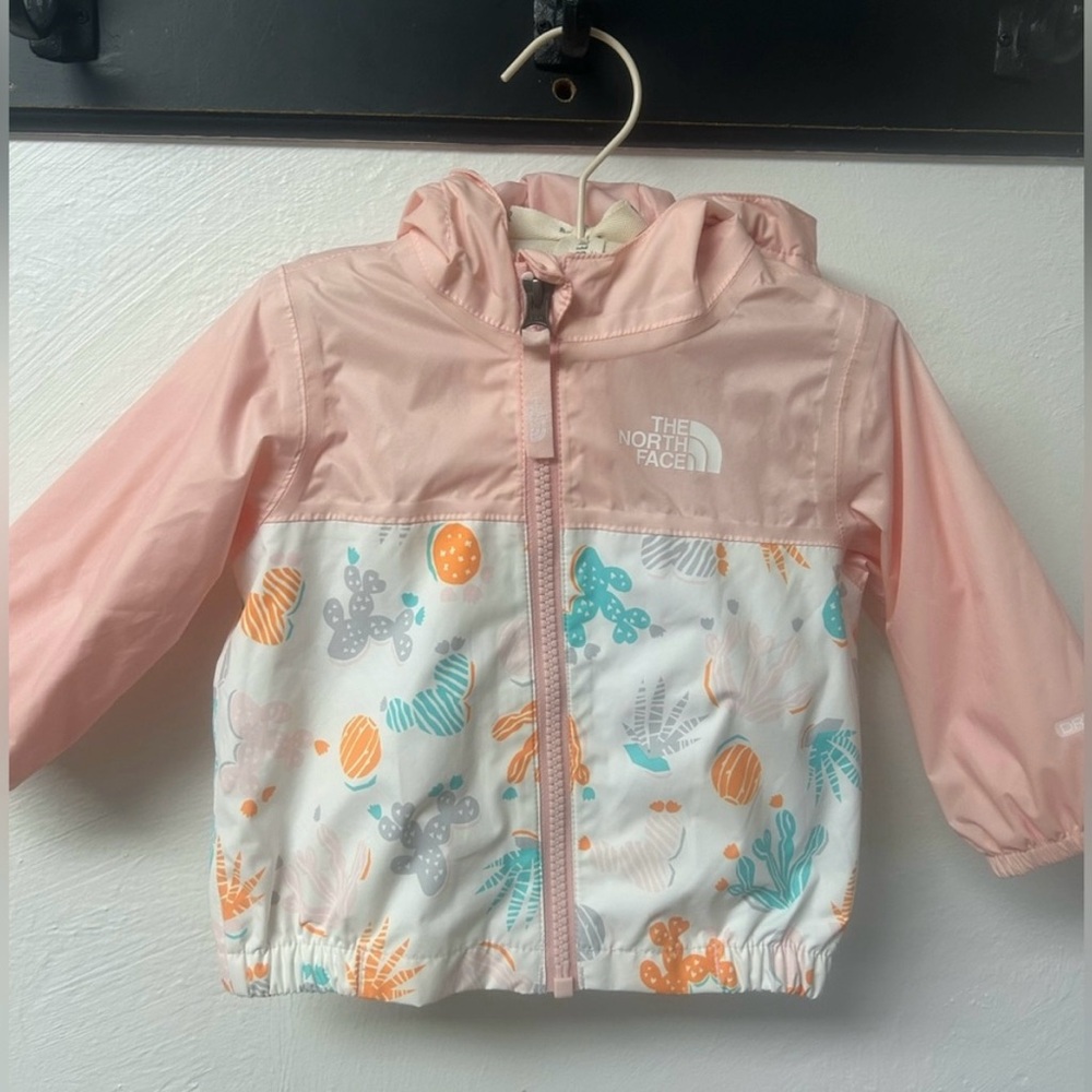 The North Face Kids Pink and White Patterned Rain Jacket